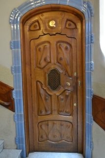 The doors were specially designed and carved for this house. The handles were hand wrought so that when you hold it, it fits perfectly with your fingers/hand